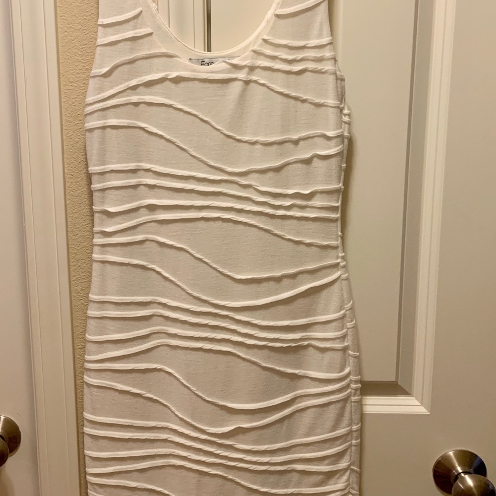 Brand new with tags, women’s size small dress